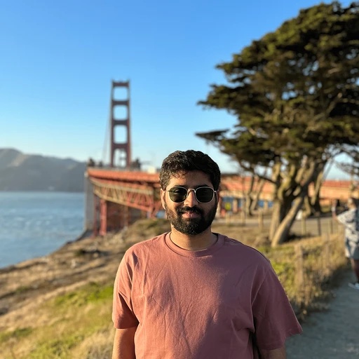 Sunil Neurgaonkar standing in front of the Golden Gate Bridge